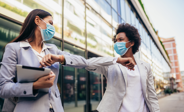 business people elbow bump